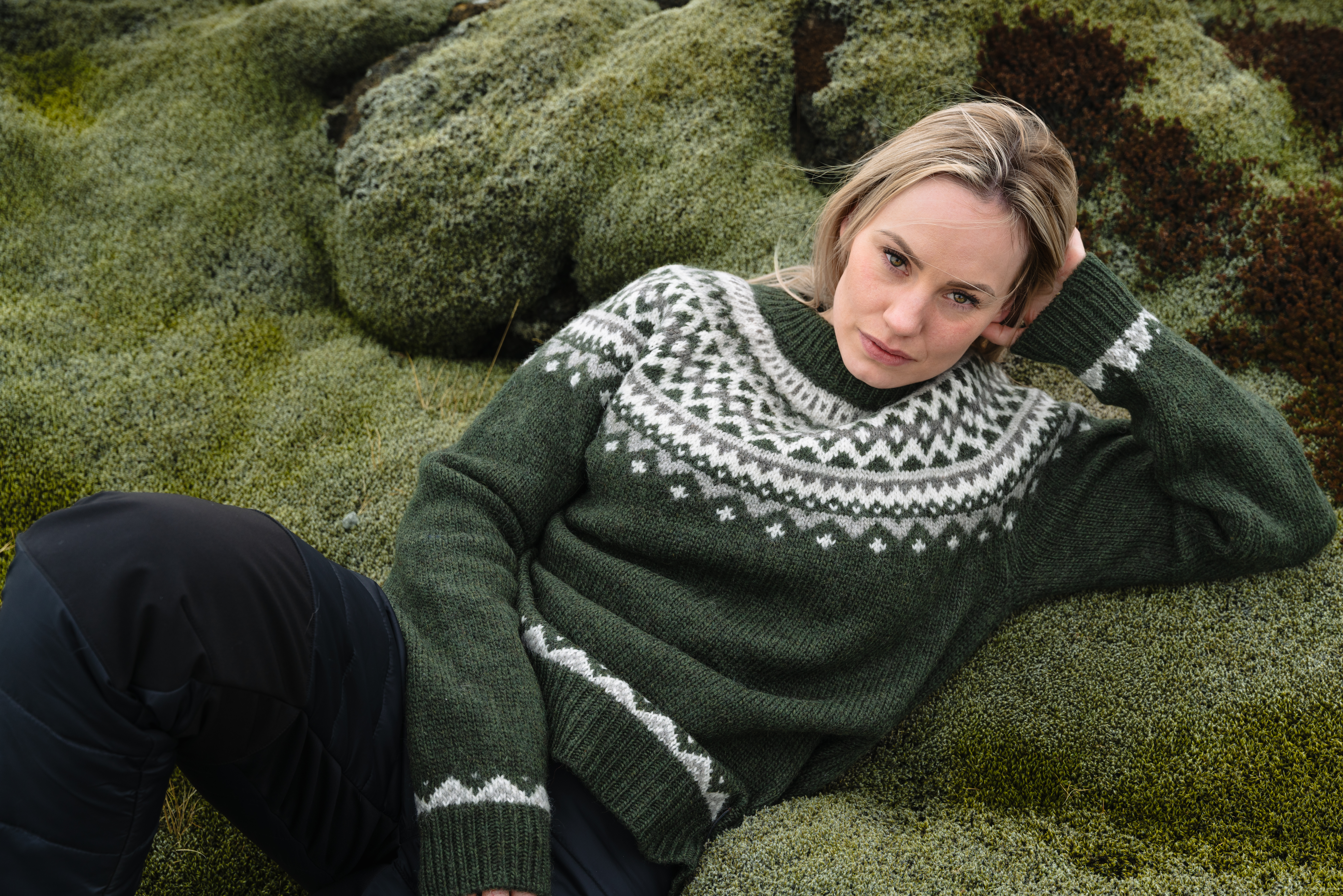 Woman lying in moss