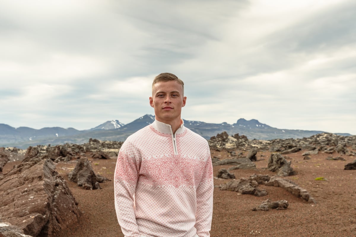 man walking in sandy lava nature