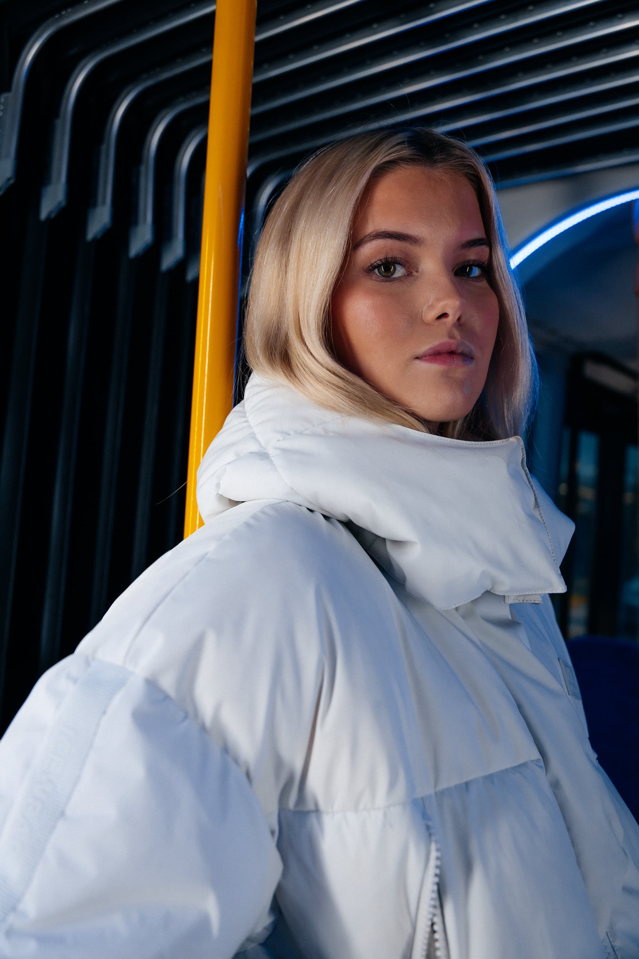 blond-woman-white-wintercoat.jpeg