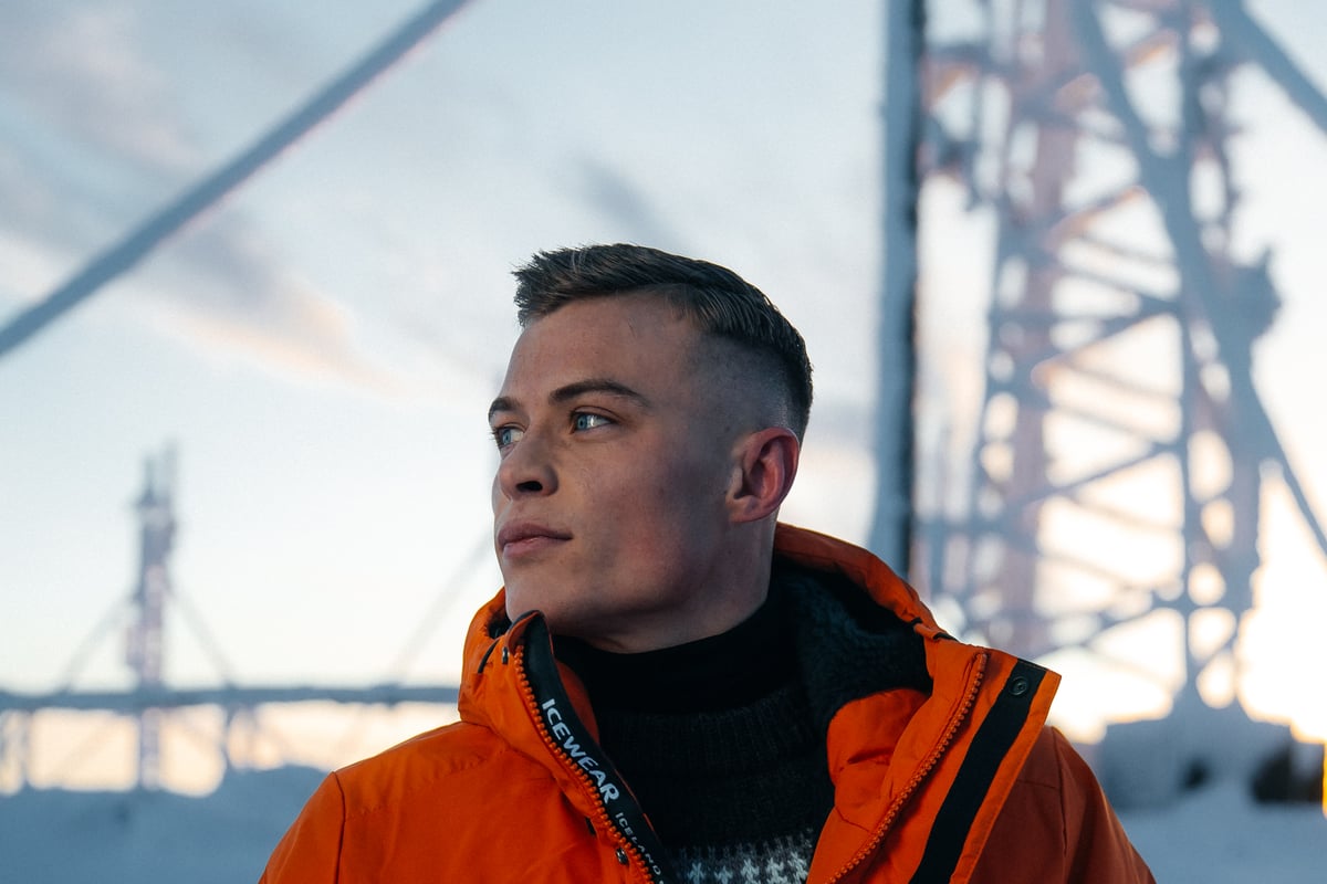 man in warm parka, a cold winter and snow day in Iceland