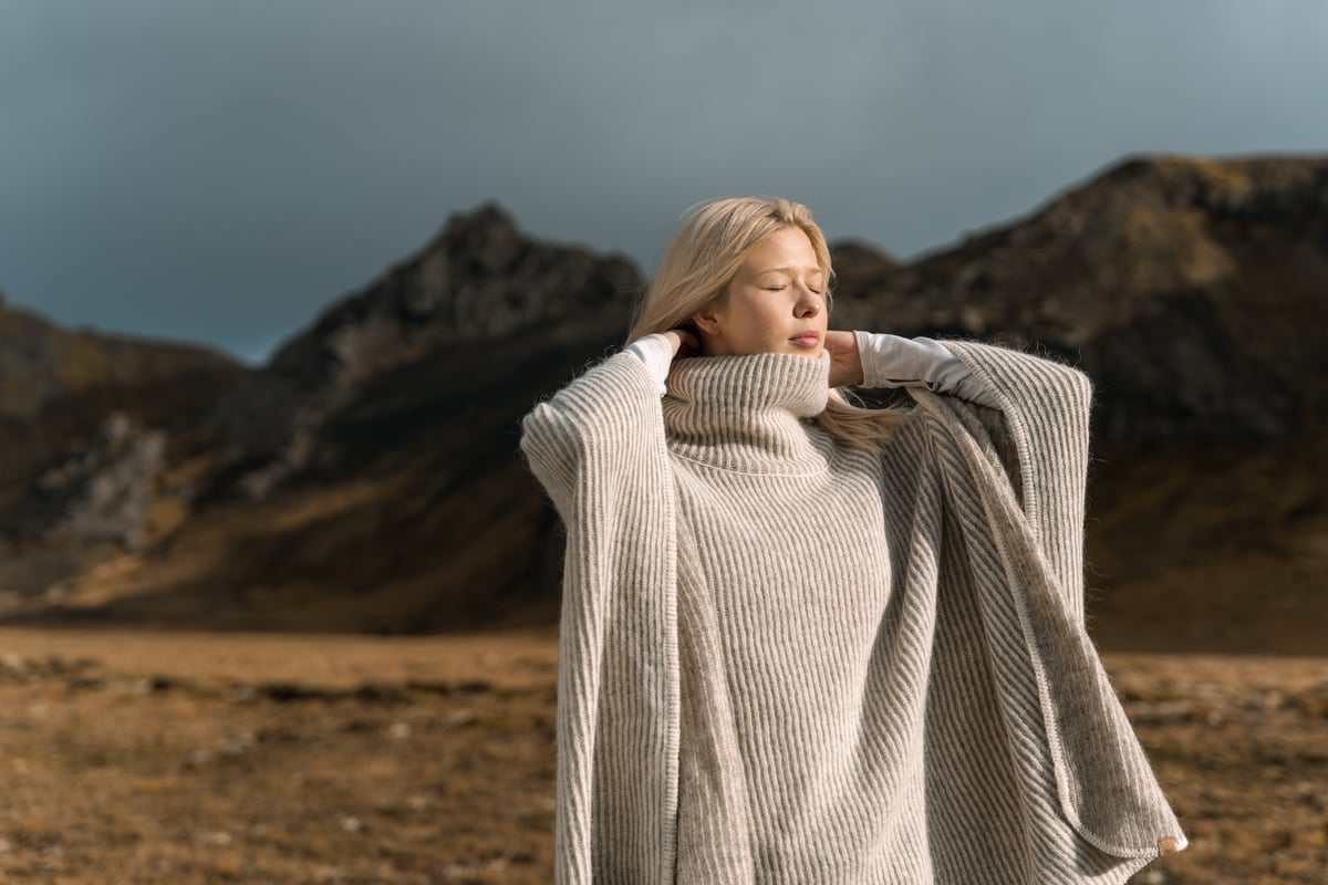 woman wearing Icewear ponsjo in Icelandic nature