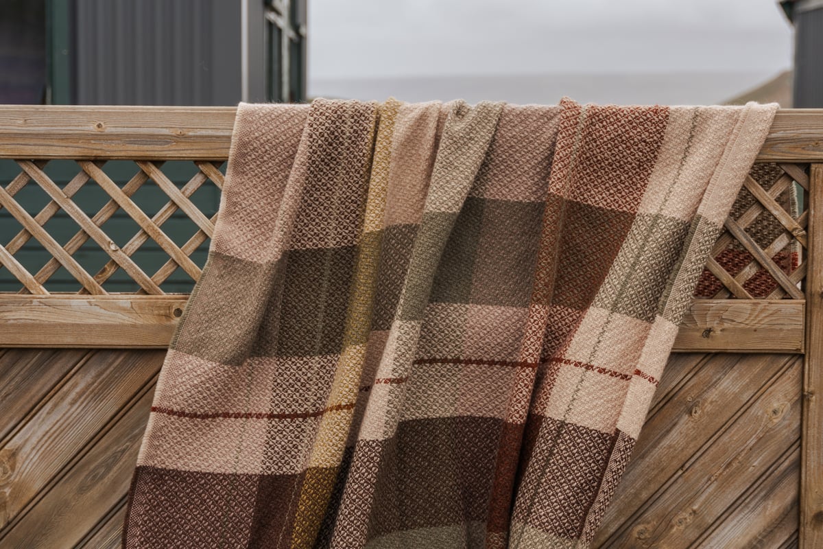 blanket on fence