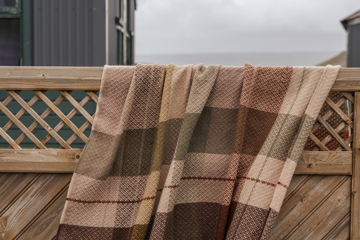 blanket on fence