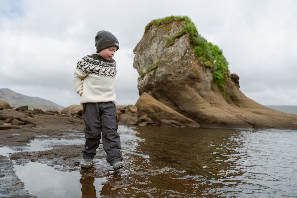boy walking in water