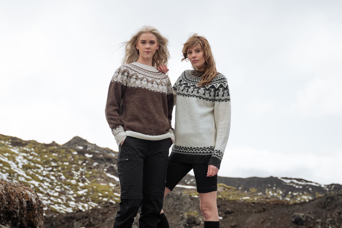 Women in woollen sweaters up the mountain