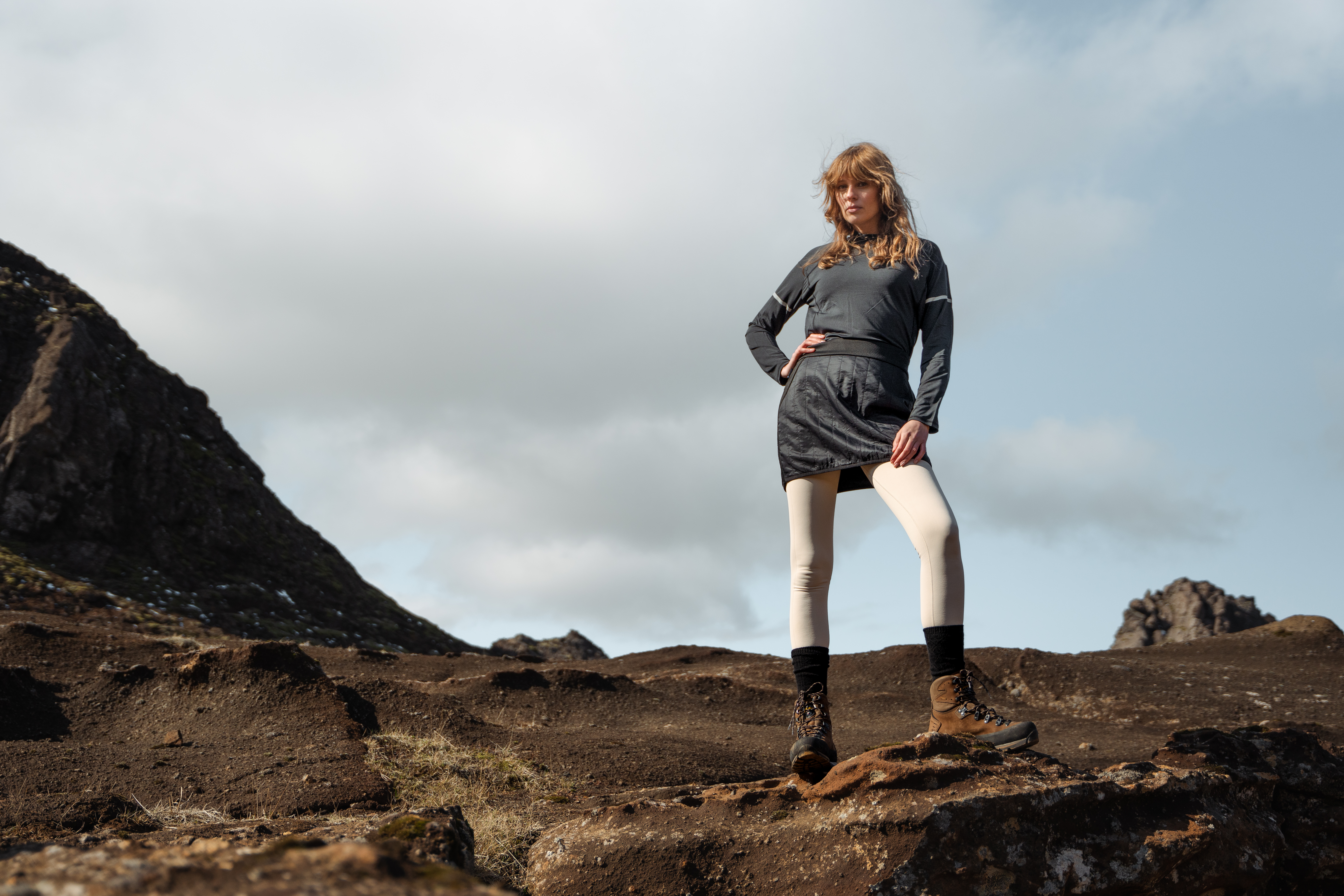 Woman up on a mountain