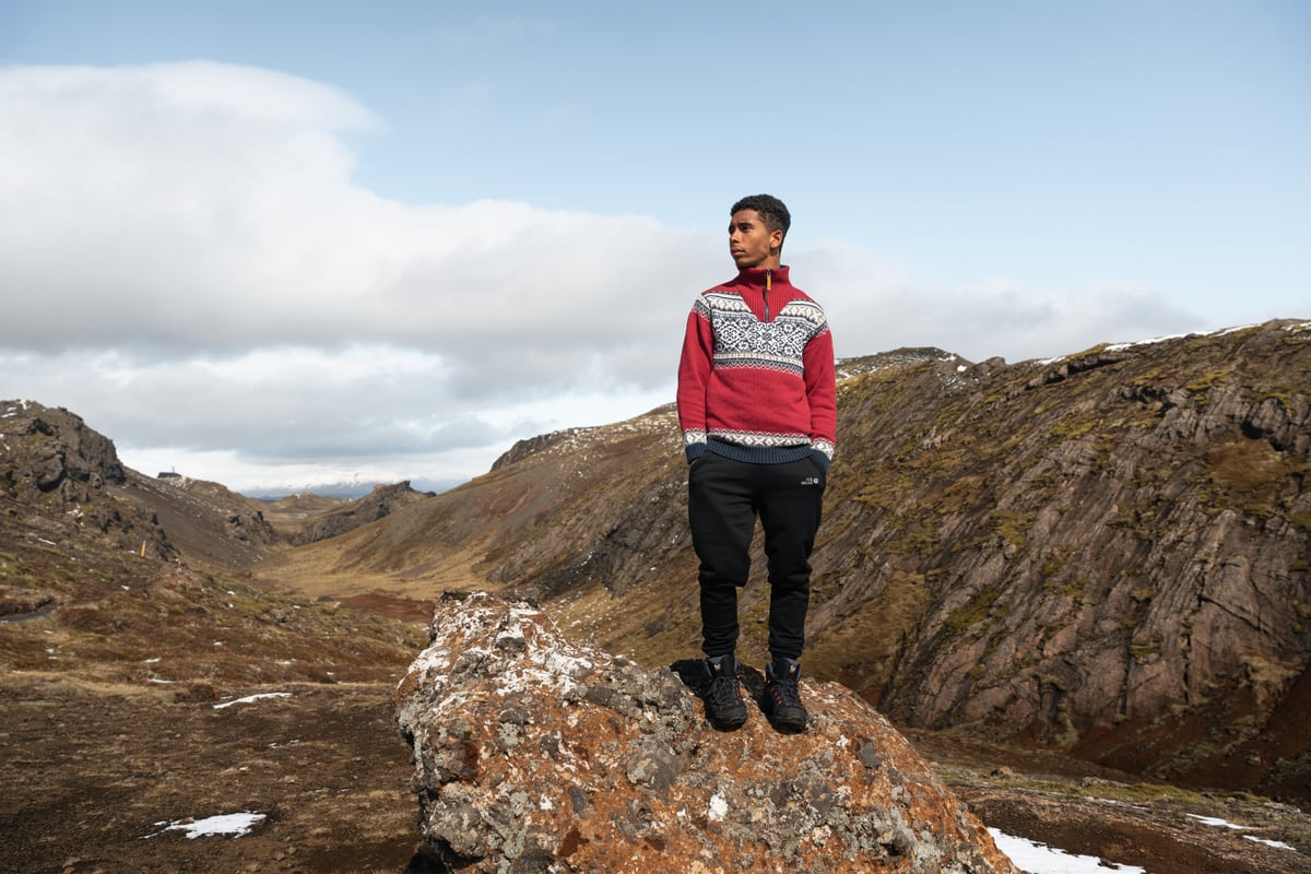 Man on a rock on a mountain