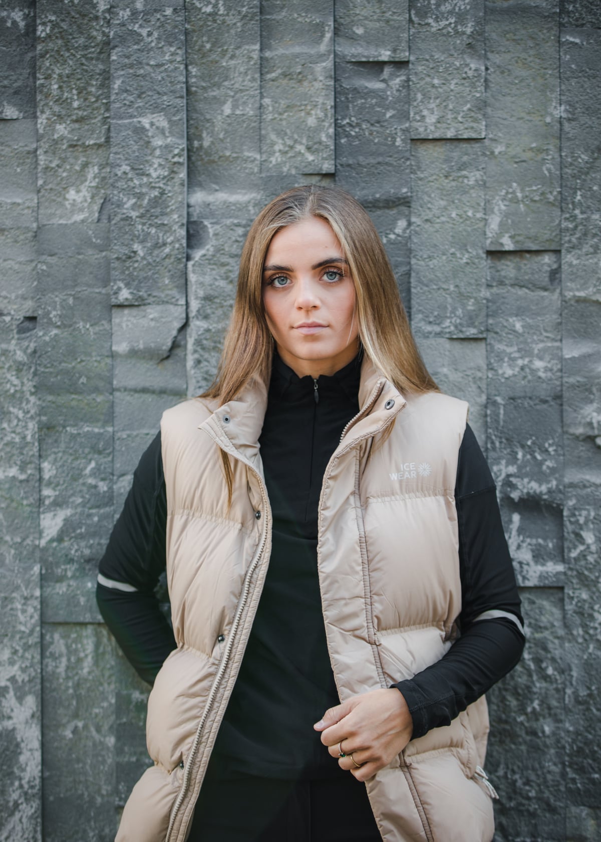 woman-lightbrown-vest-sweater-1.jpeg