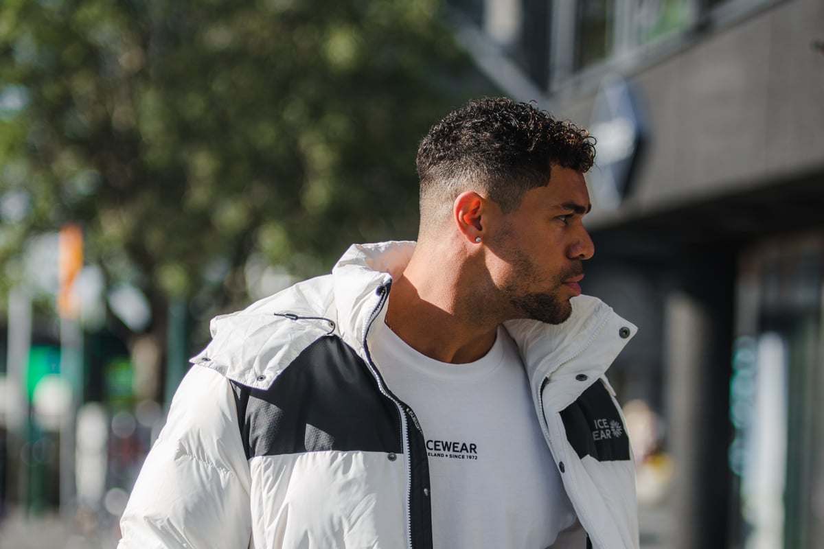 man wearing down jacket in Reykjavík city center