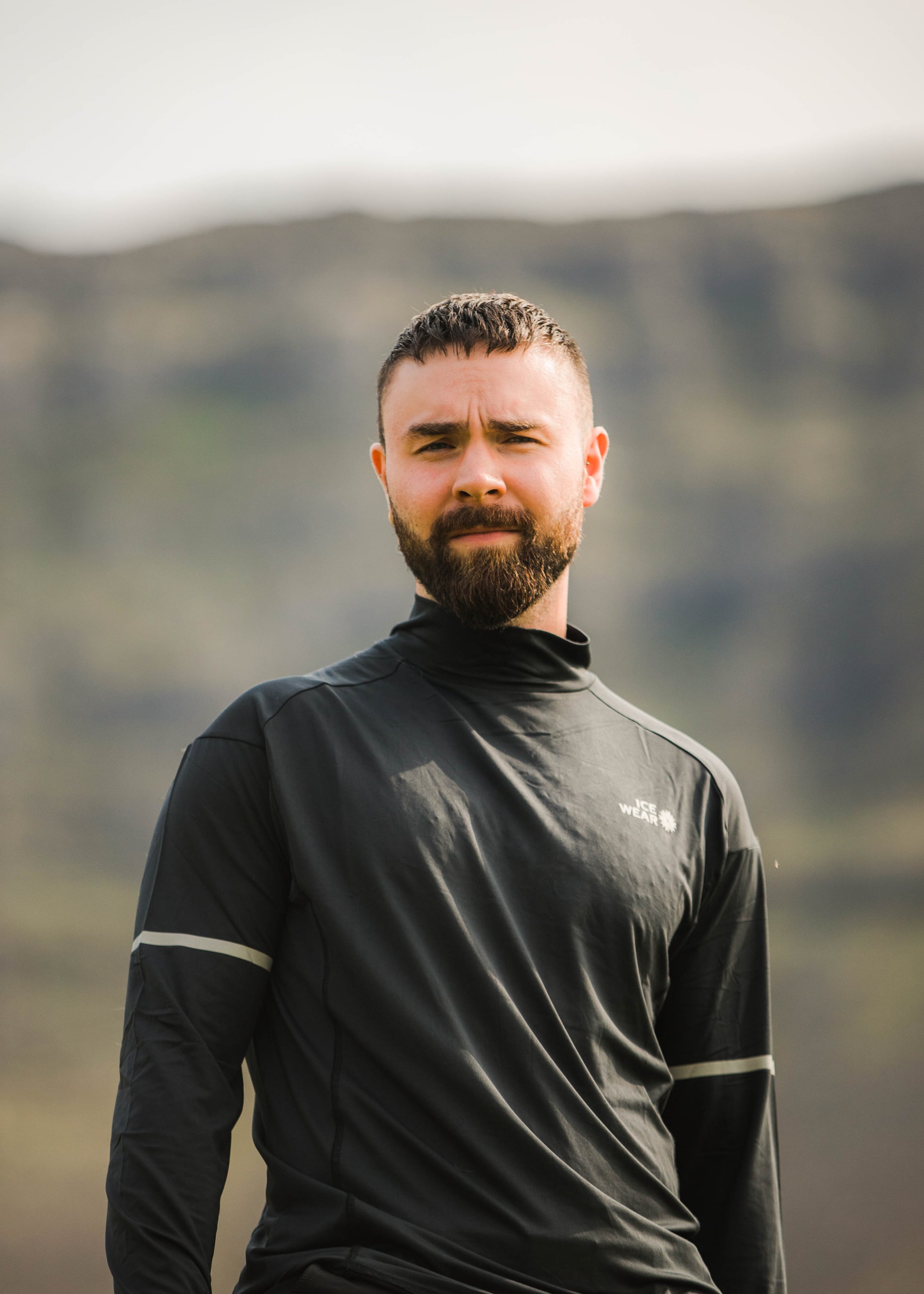 man-athletic-top-black-turtleneck.jpeg