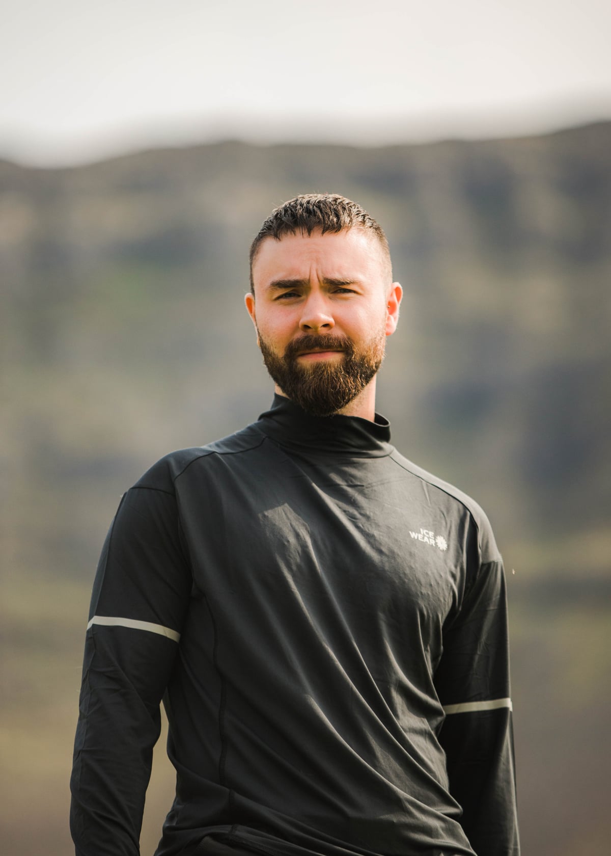 man-athletic-top-black-turtleneck.jpeg