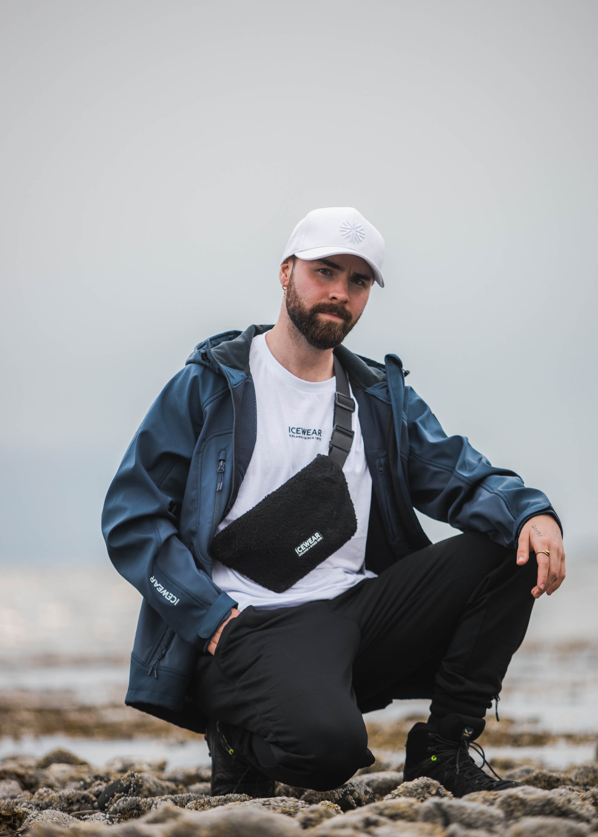 man-light-jacket-bag-cap.jpeg