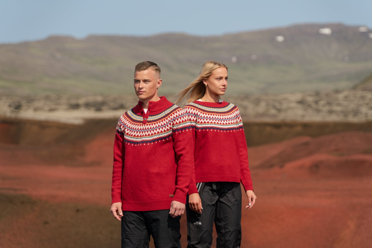 A couple in Christmassy sweaters