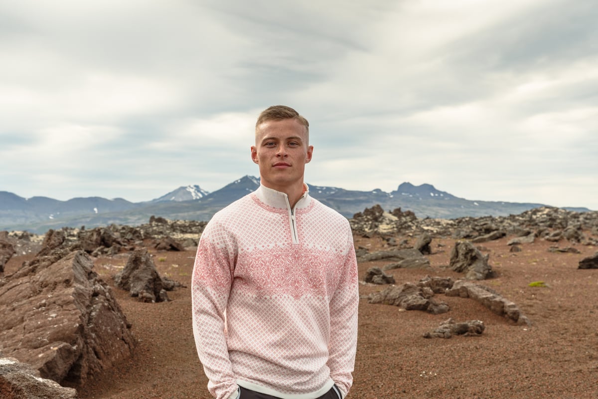 man walking in sandy lava nature