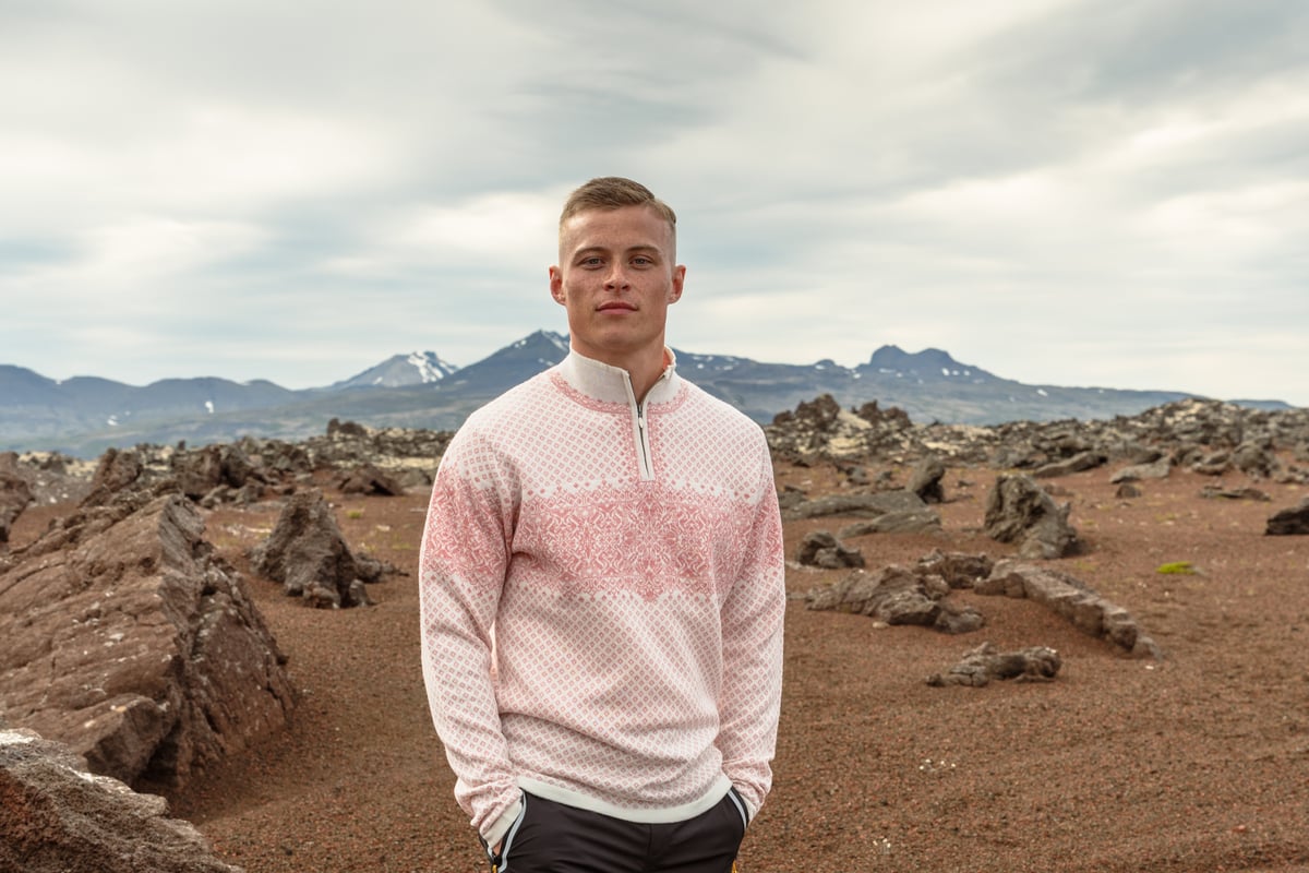 man walking in sandy lava nature