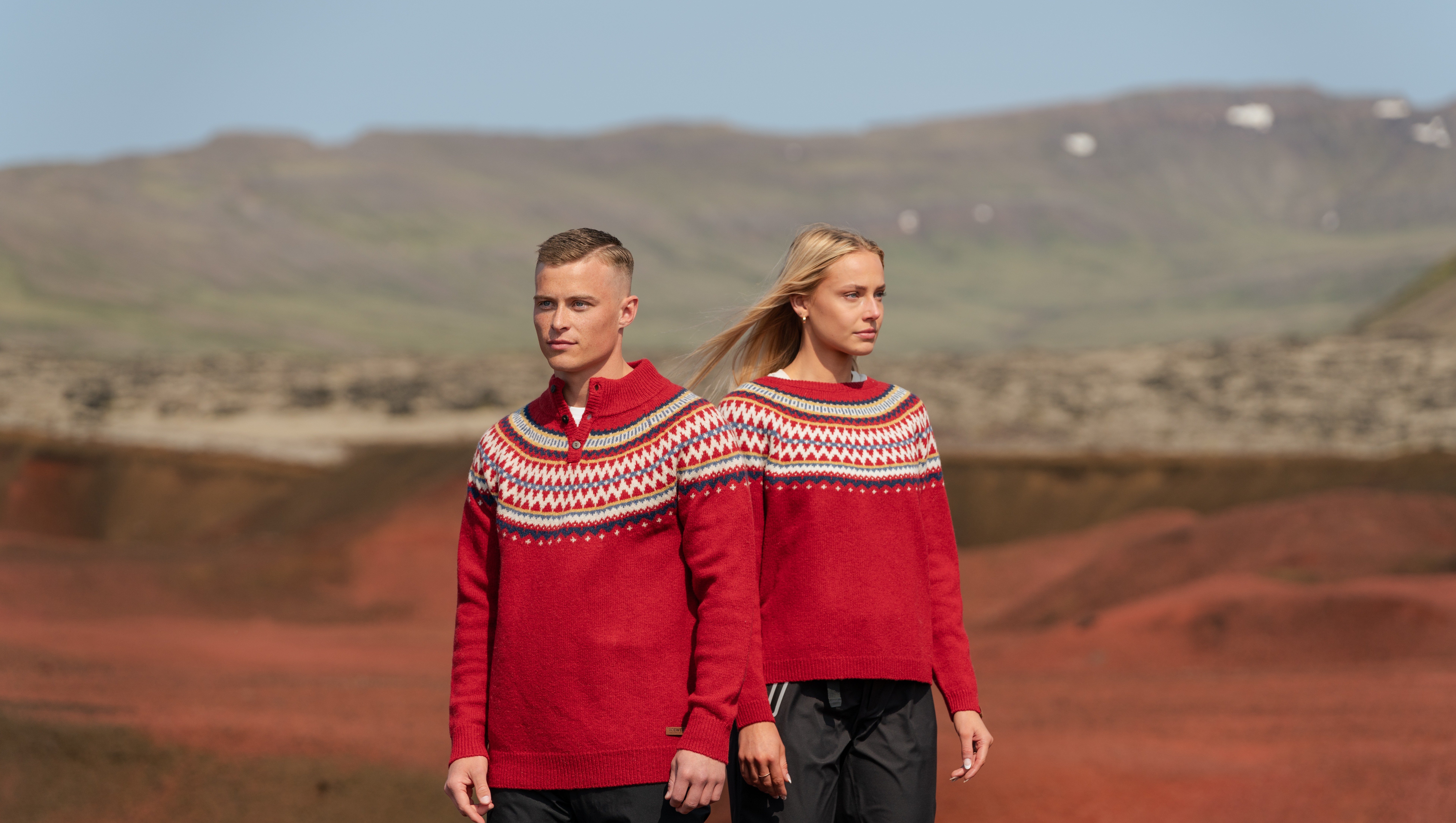 A couple in Christmassy sweaters