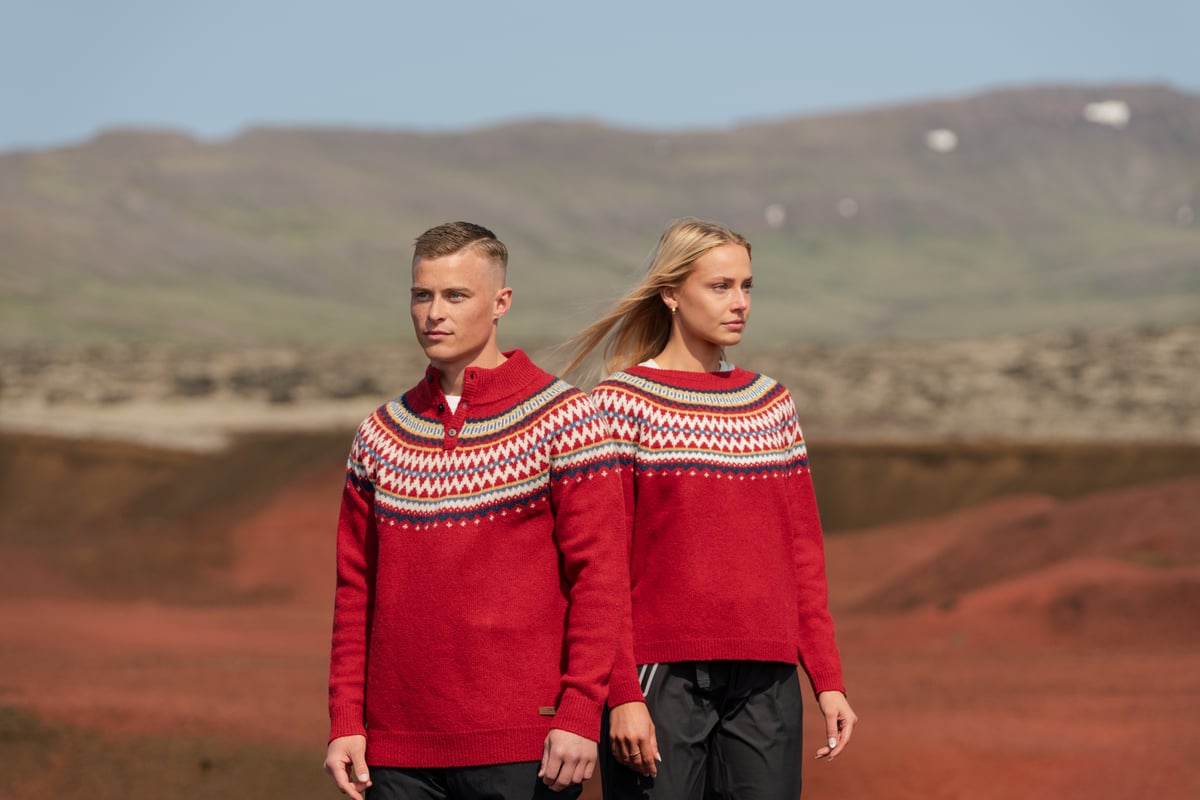 A couple in Christmassy sweaters