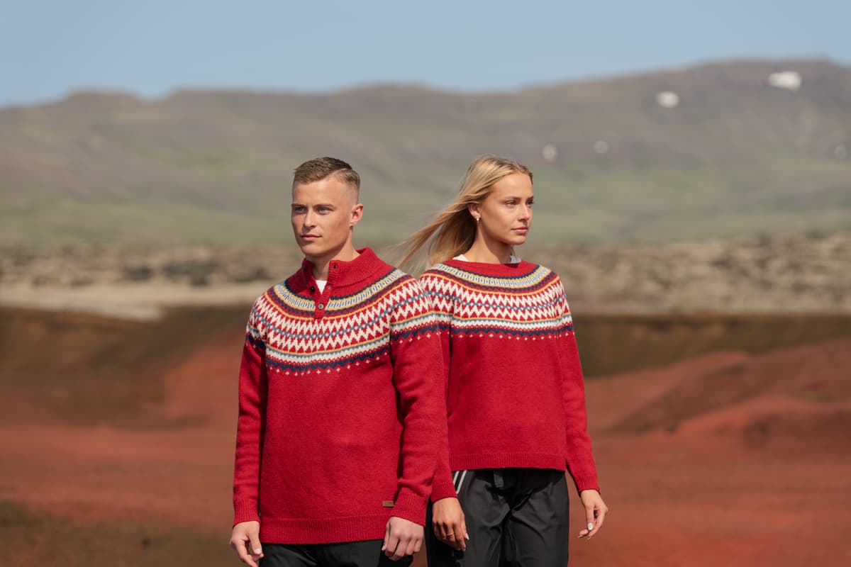 A couple in Christmassy sweaters